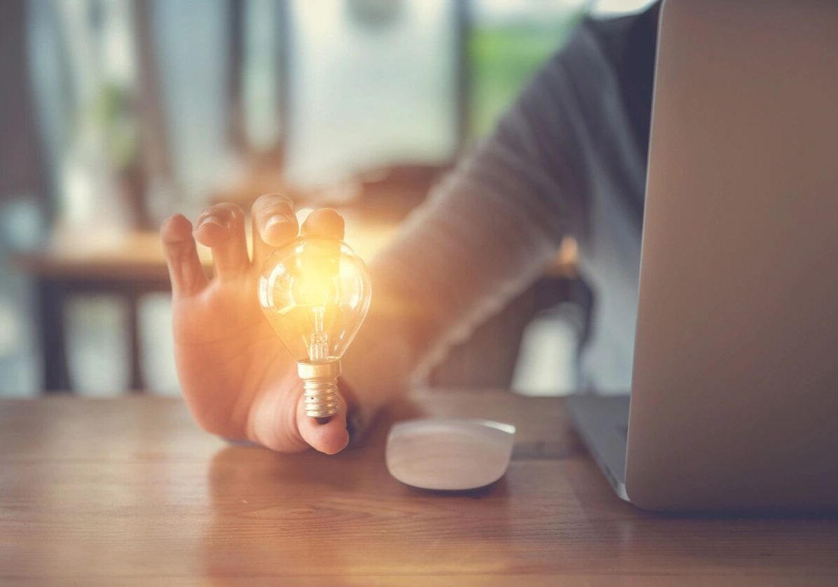 man handling the light bulb